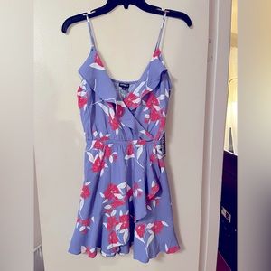Adorable floral ruffle dress, great for casual or dressing up.  New with tags!